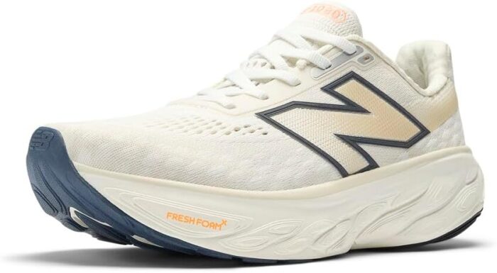 New Balance Women's Fresh Foam X 1080 V14 Running Shoe, Sea Salt/Vintage Indigo/Hot Mango, 9 | Road Running - Image 1